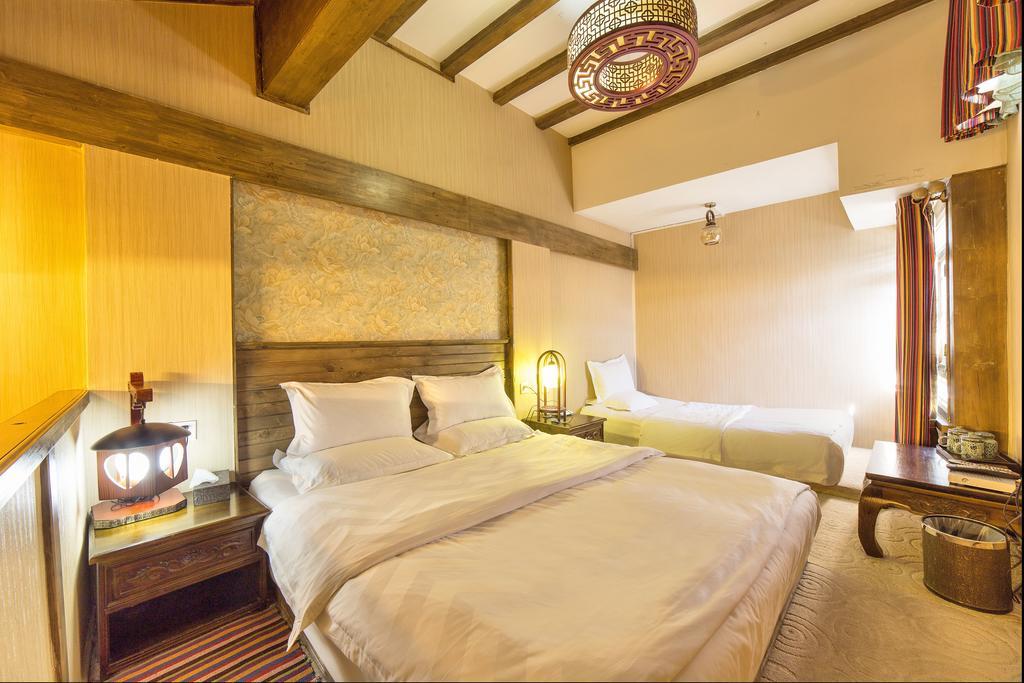 Yi Liu Hostel Lijiang  Rom bilde