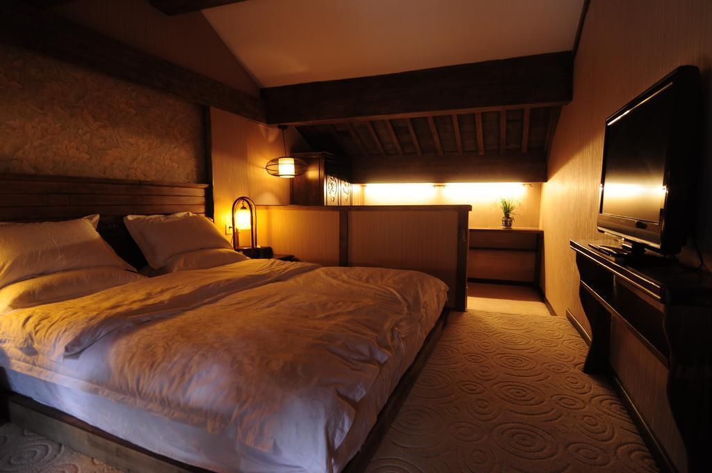 Yi Liu Hostel Lijiang  Rom bilde