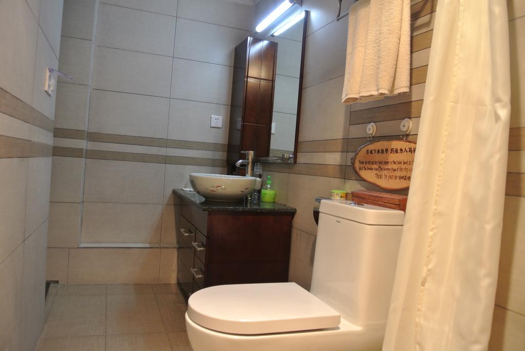 Yi Liu Hostel Lijiang  Rom bilde