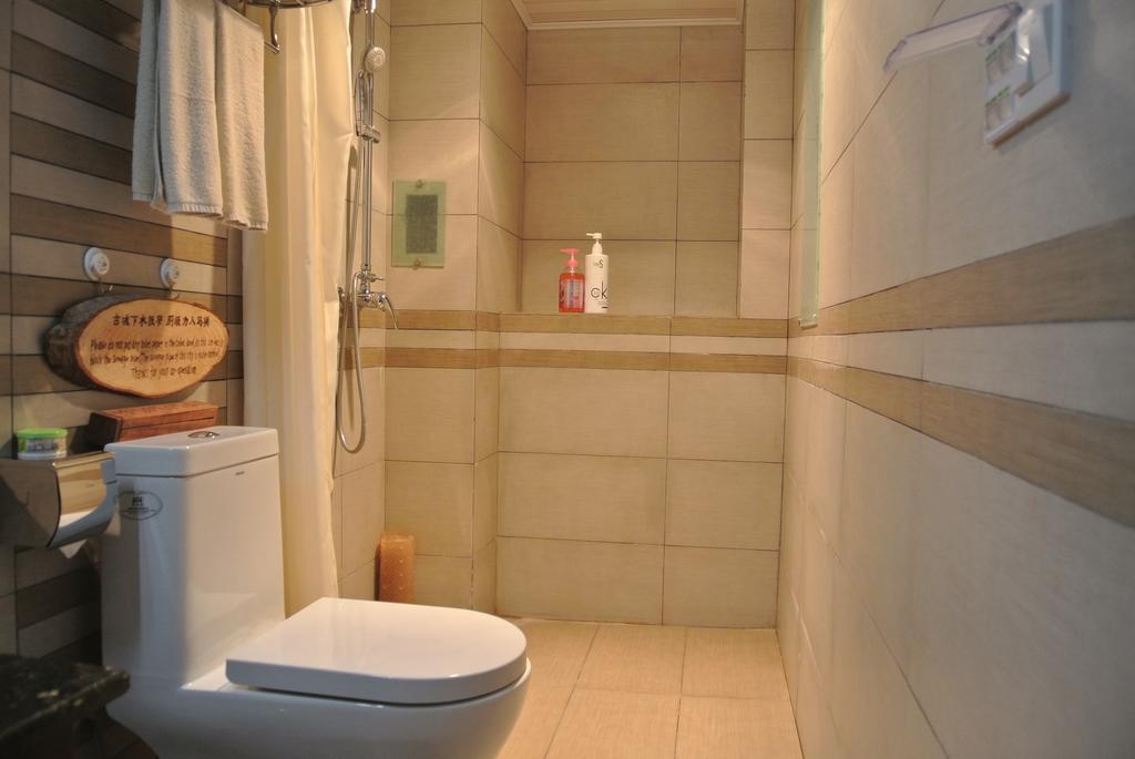 Yi Liu Hostel Lijiang  Rom bilde