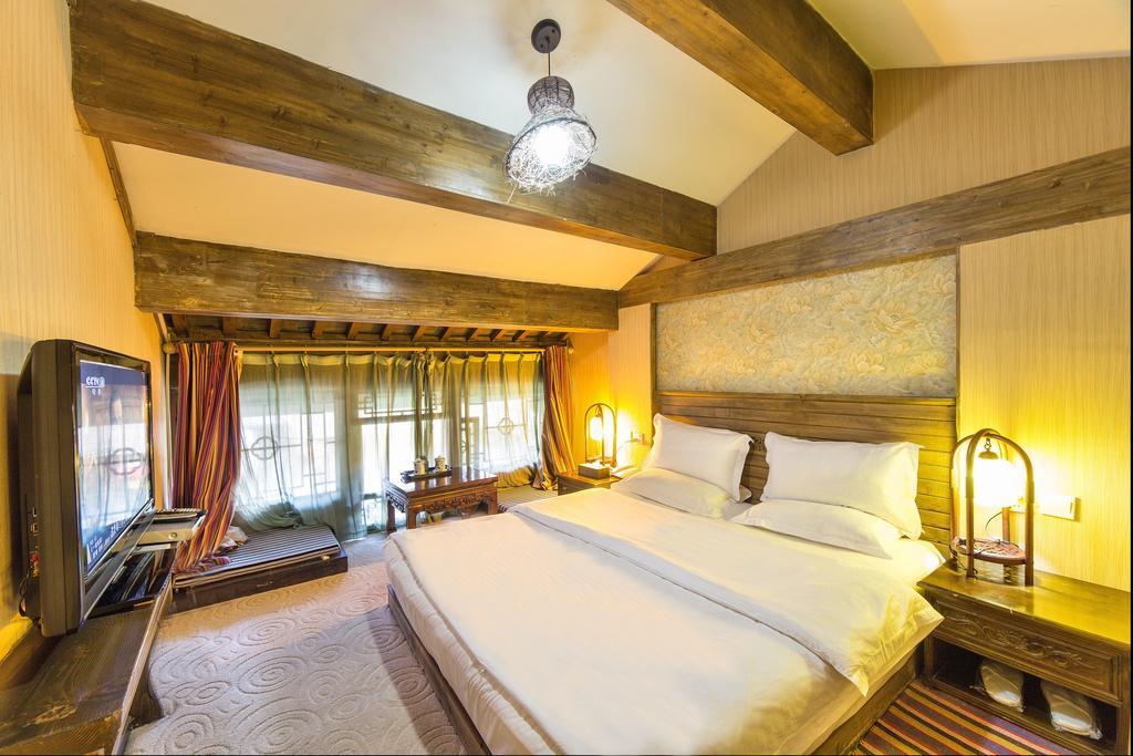 Yi Liu Hostel Lijiang  Rom bilde