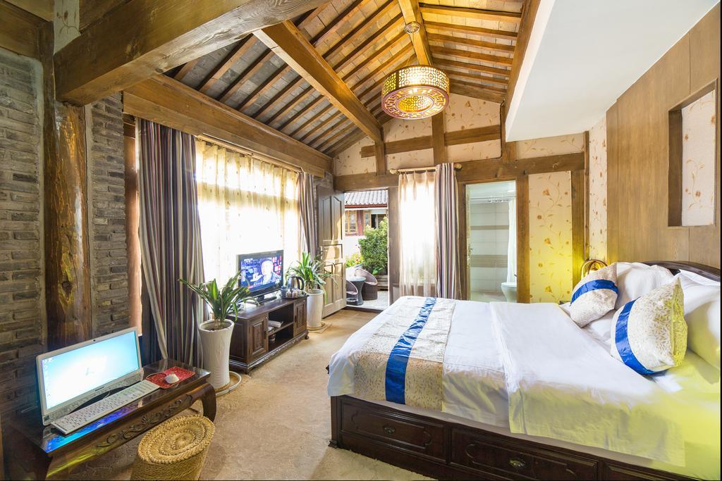 Yi Liu Hostel Lijiang  Rom bilde