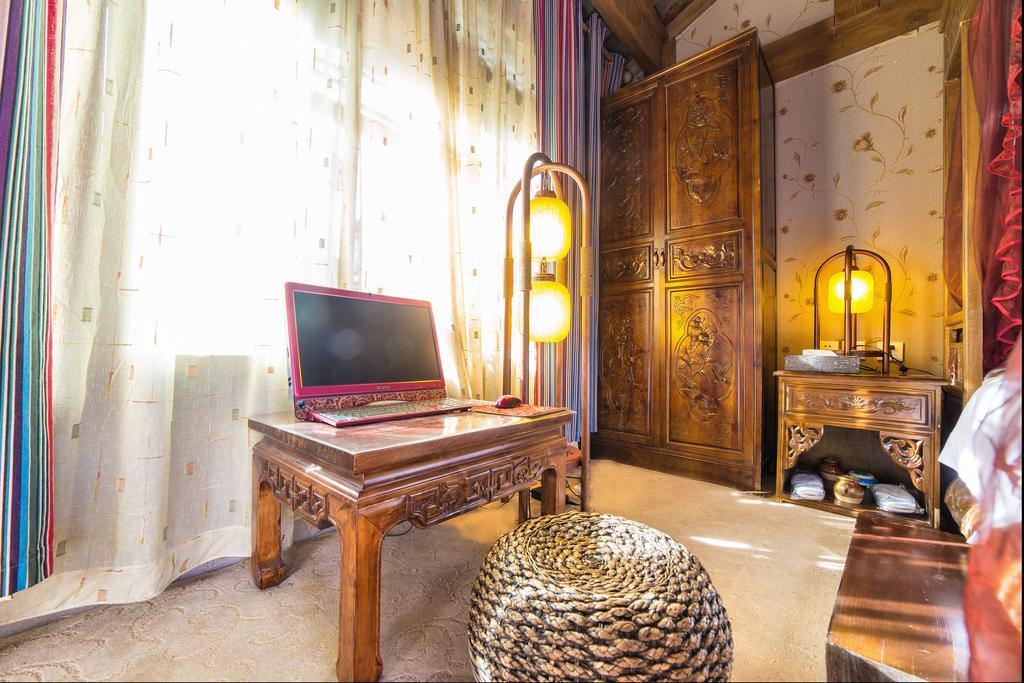 Yi Liu Hostel Lijiang  Rom bilde