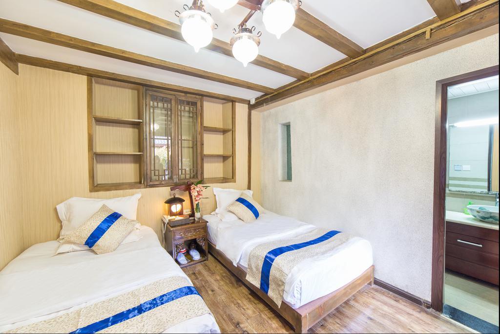 Yi Liu Hostel Lijiang  Rom bilde
