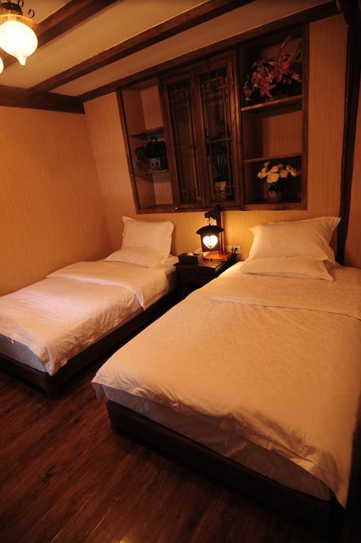 Yi Liu Hostel Lijiang  Rom bilde